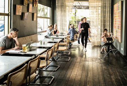 F L A T I R O N Side Door Wine Bar